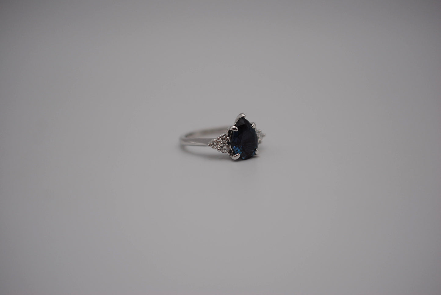 Alexandrite Ring: Pear Cut, Diamond Melee, White Gold