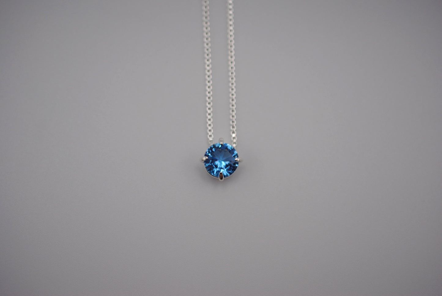 Birthstone Necklace: Round Aquamarine, Silver Prongs, Adjustable Chain