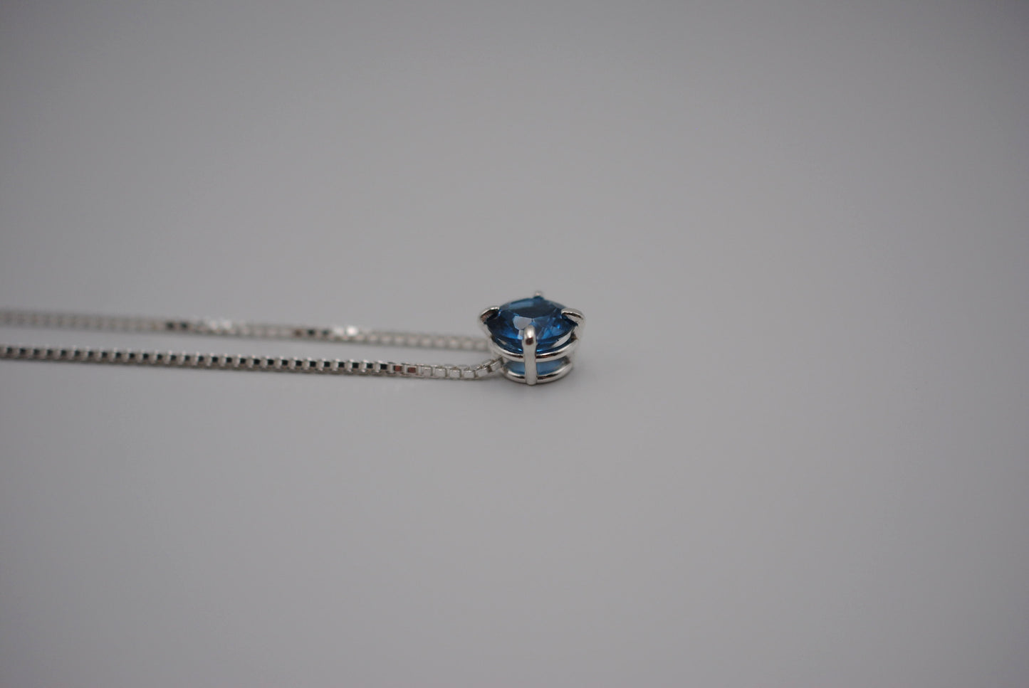 Birthstone Necklace: Round Blue Zircon, Silver Prong Setting, Adjustable Chain