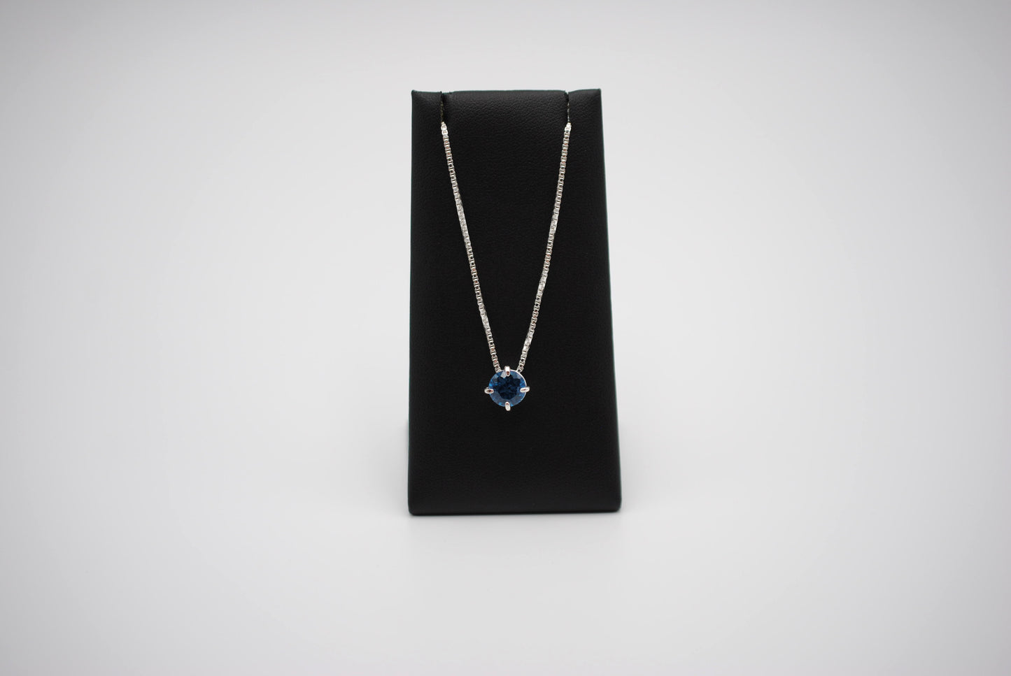 Birthstone Necklace: Round Blue Zircon, Silver Prong Setting, Adjustable Chain