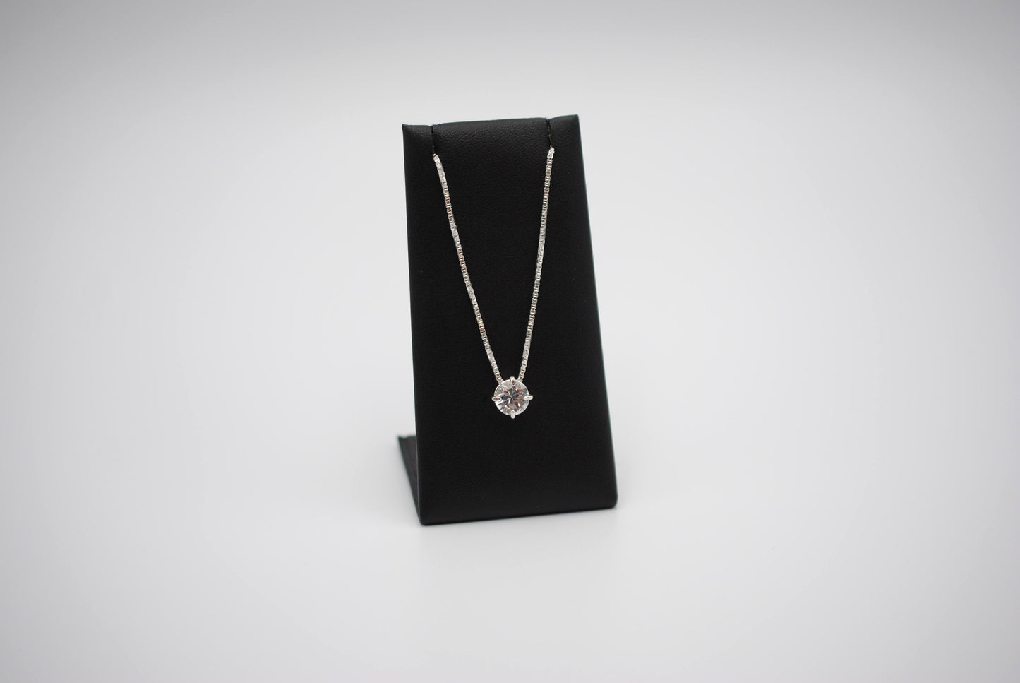Birthstone Necklace: Round Cubic Zirconia, Silver Prong Setting, Adjustable Chain