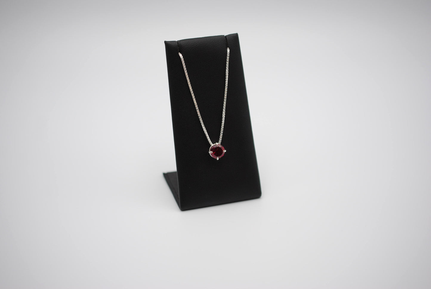 Birthstone Necklace: Round Garnet, Silver Prong Setting, Adjustable Chain