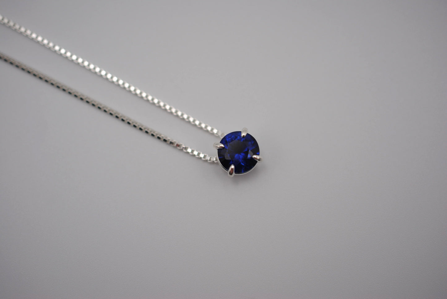 Birthstone Necklace: Round Sapphire, Silver Prong Setting, Adjustable Box Chain