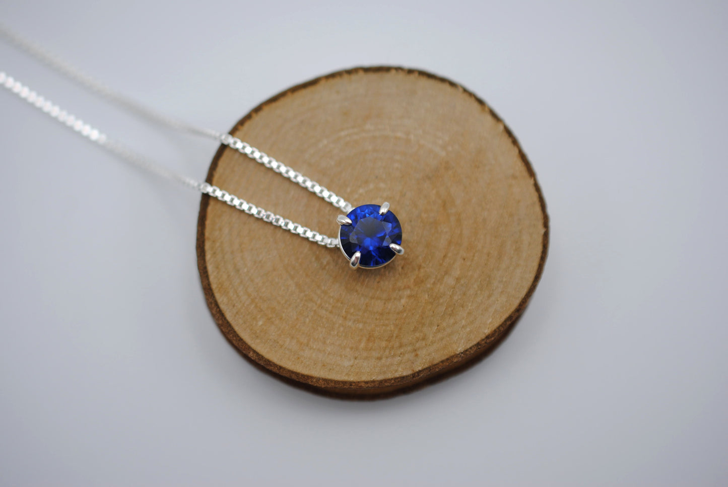 Birthstone Necklace: Round Sapphire, Silver Prong Setting, Adjustable Box Chain