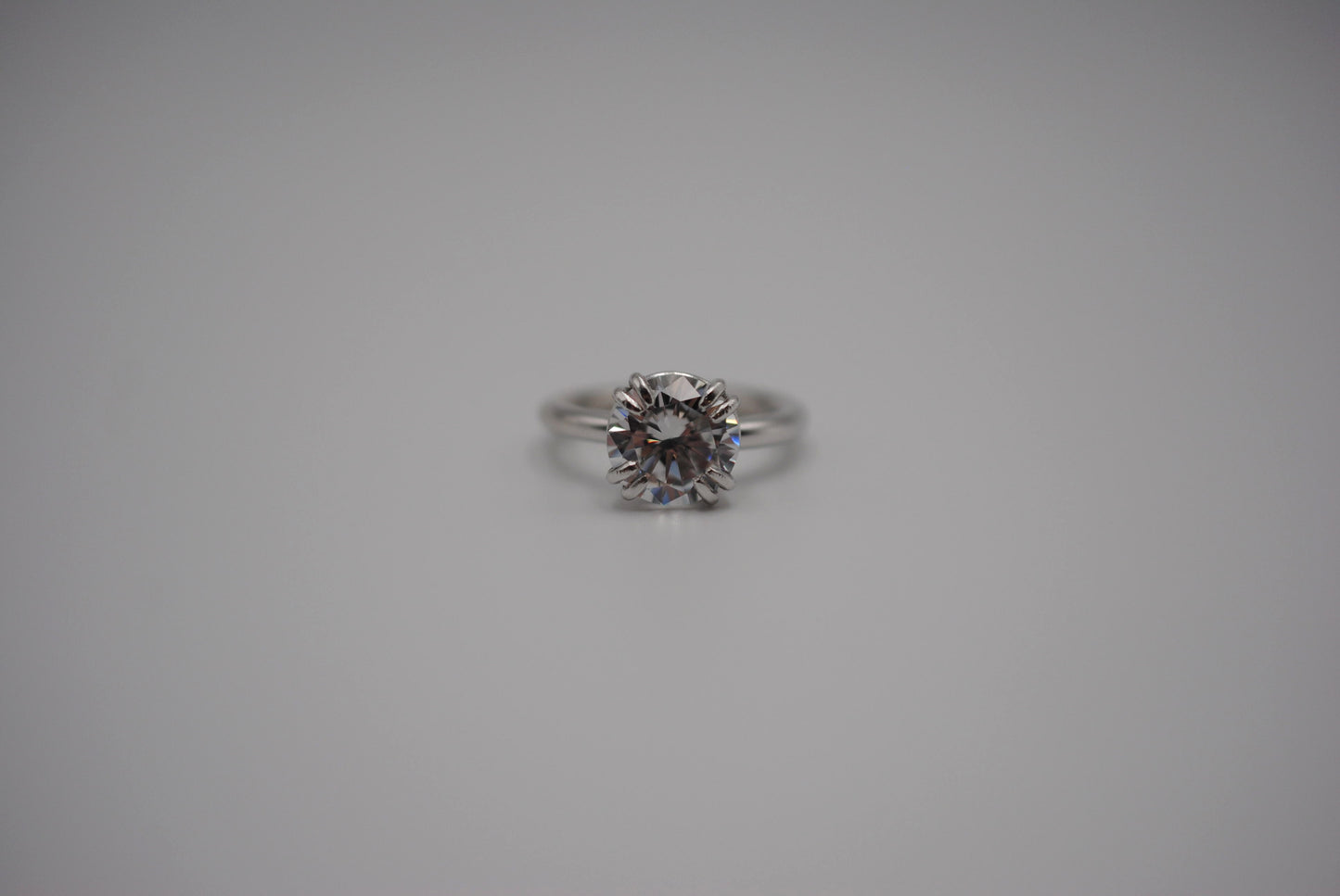 Cubic Zirconia Ring: Round Cut, Double Prong Setting, Rhodium Finished