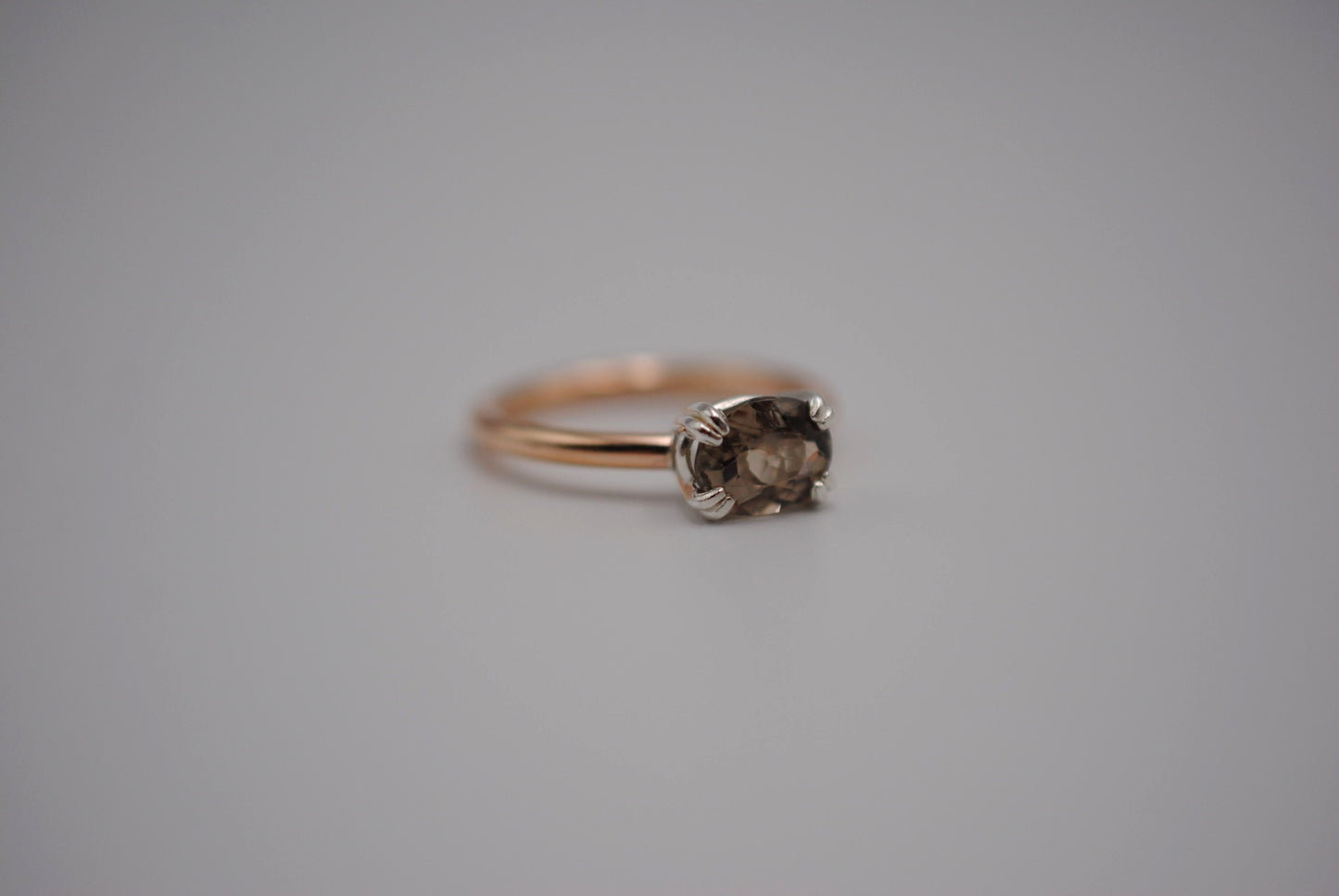 Diaspore Ring: Oval Cut, Yellow Gold Fill Band, East-West Silver Setting