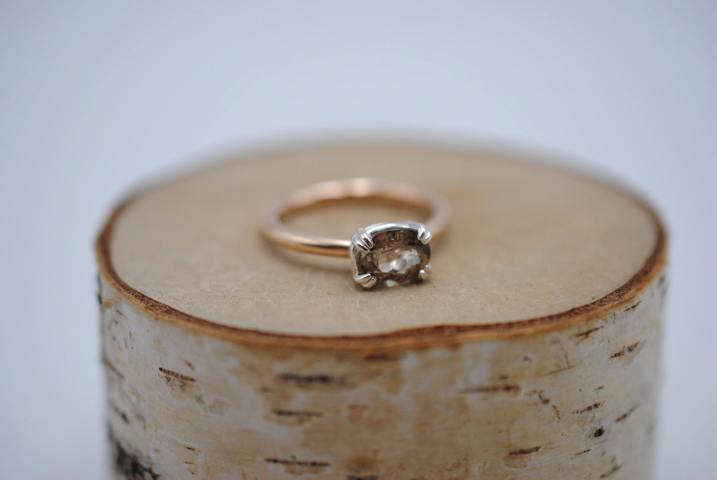 Diaspore Ring: Oval Cut, Yellow Gold Fill Band, East-West Silver Setting