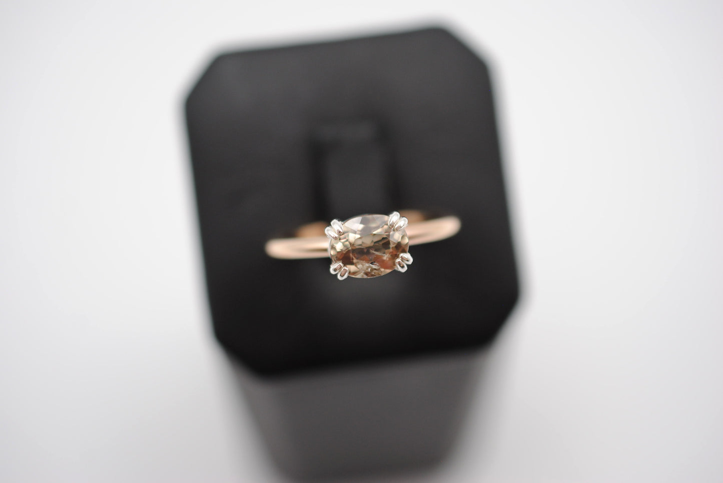 Diaspore Ring: Oval Cut, Yellow Gold Fill Band, East-West Silver Setting