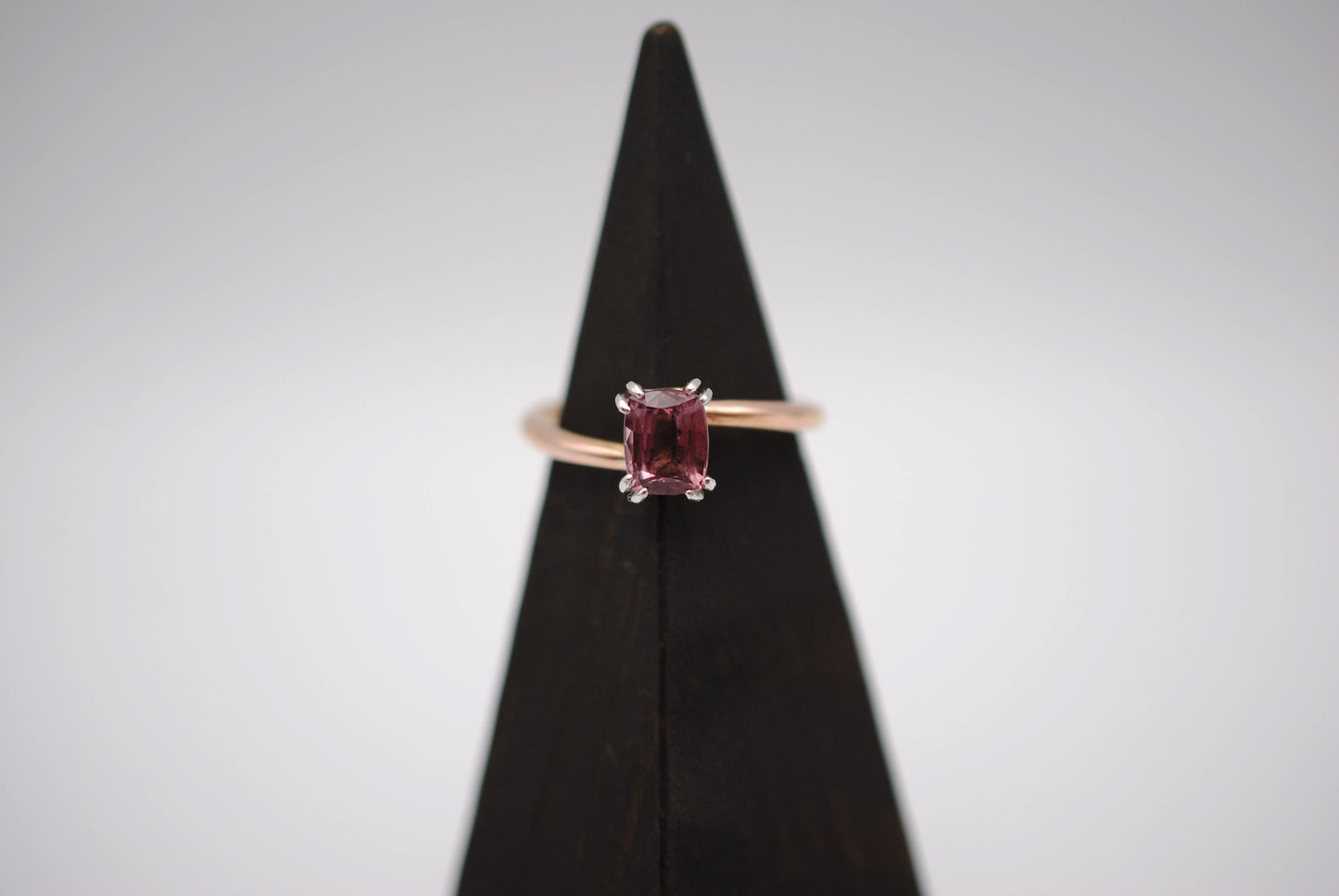 Malaia Garnet Ring: Emerald Cut, Rose Gold Bypass Band, White Gold Setting