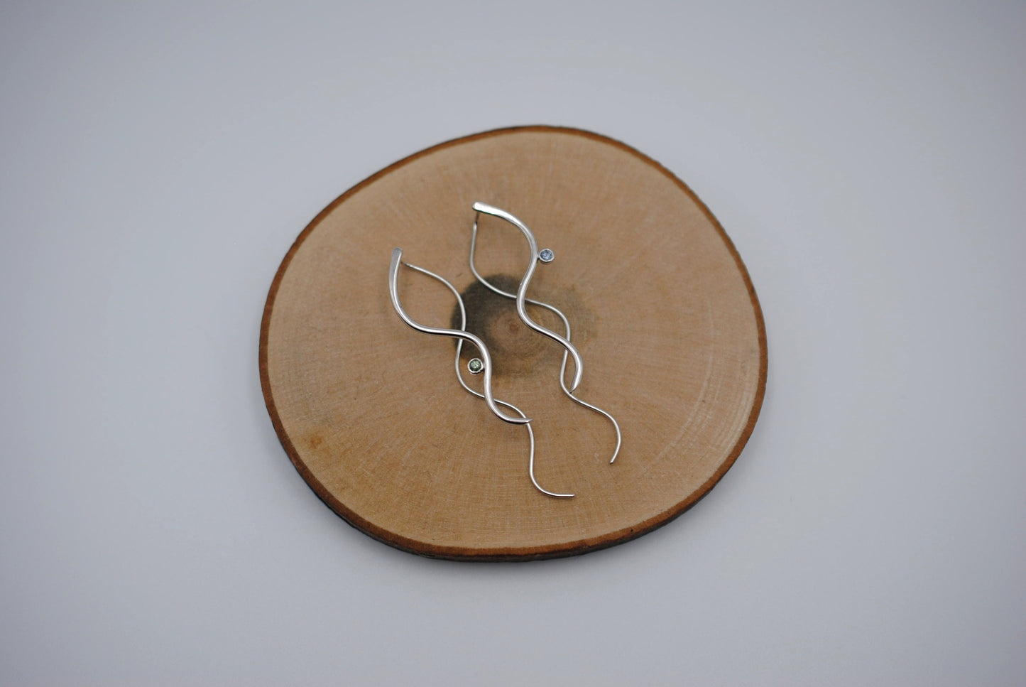 Sapphire Earrings: Infinity, Round Cut, Rhodium Finished