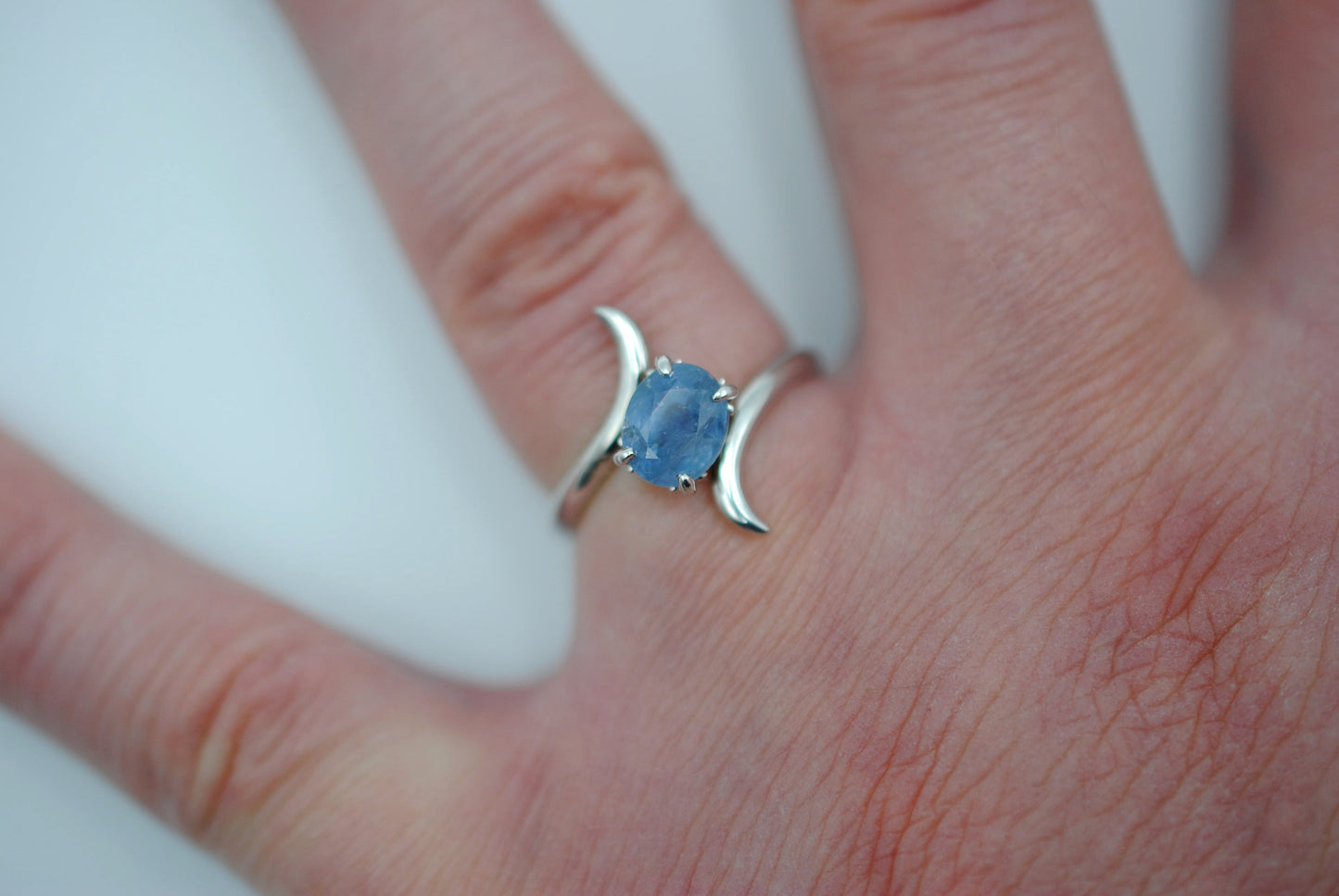 Sapphire Ring: Oval Cut, White Gold, Bypass Band