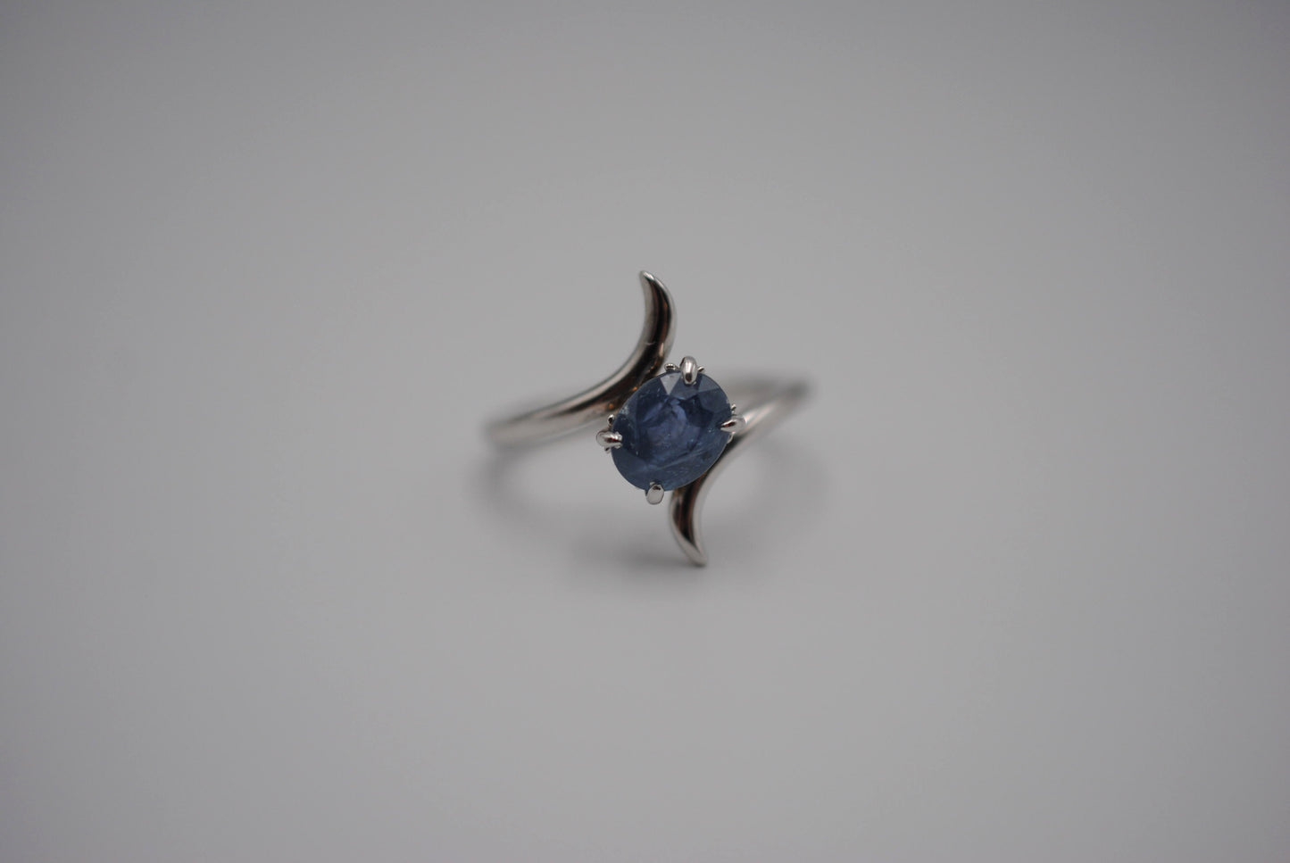 Sapphire Ring: Oval Cut, White Gold, Bypass Band