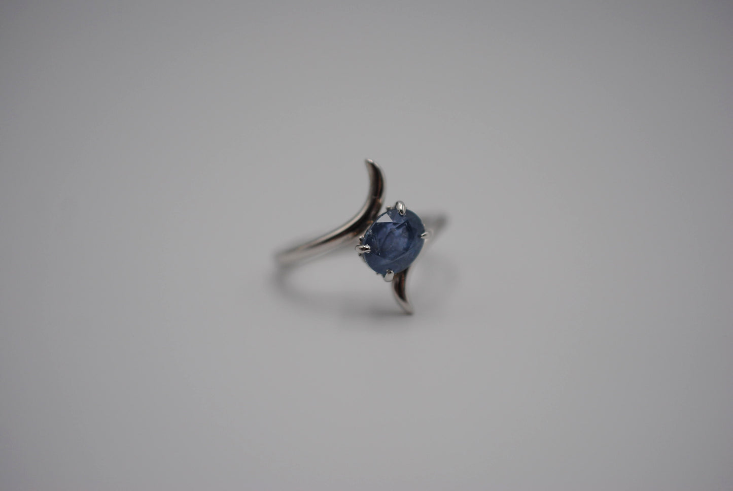 Sapphire Ring: Oval Cut, White Gold, Bypass Band