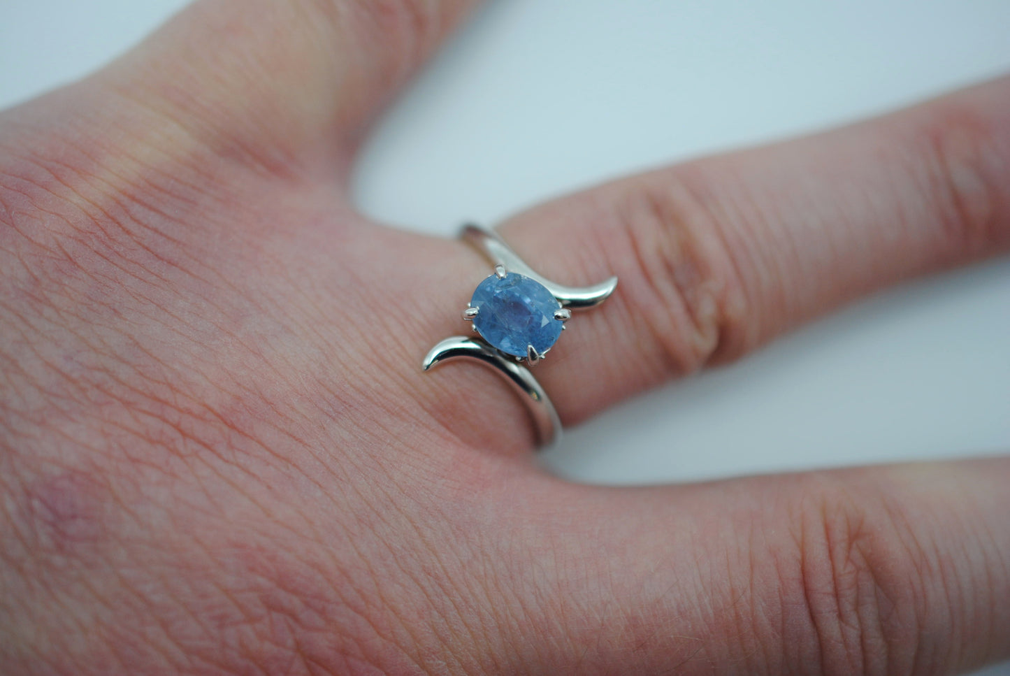 Sapphire Ring: Oval Cut, White Gold, Bypass Band