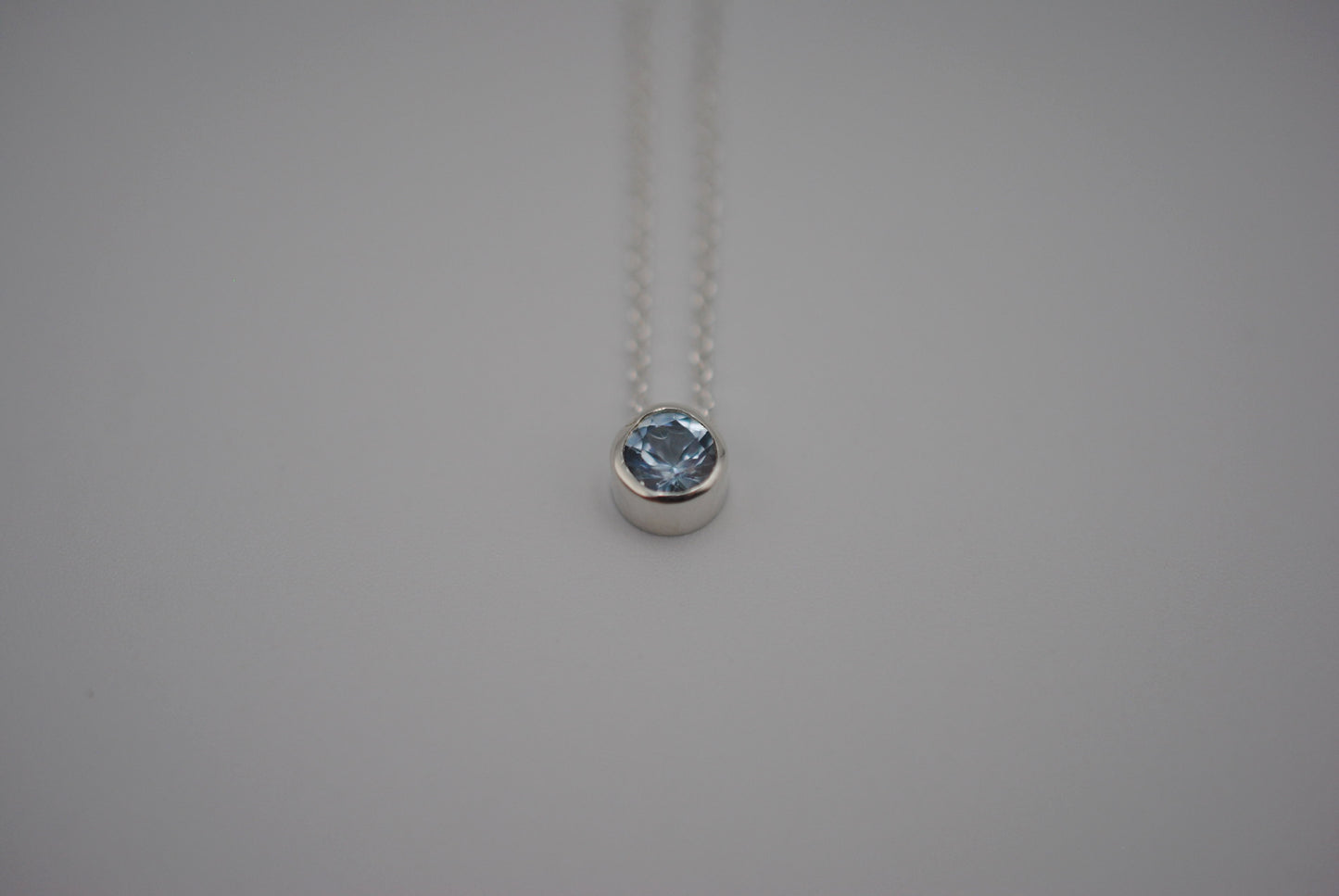 Birthstone Necklace: Round Aquamarine, Bezel, Silver, Cable Chain