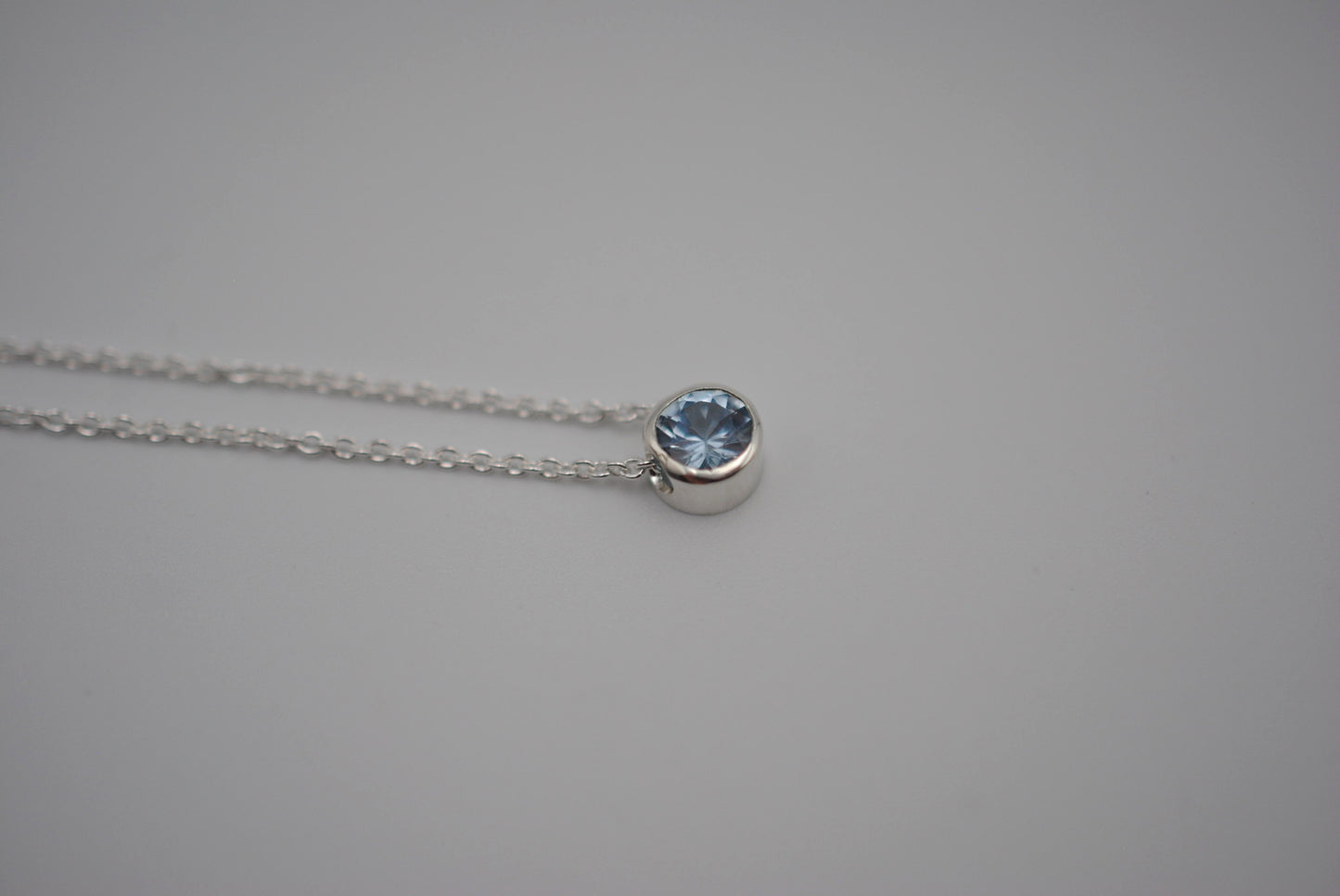 Birthstone Necklace: Round Aquamarine, Bezel, Silver, Cable Chain