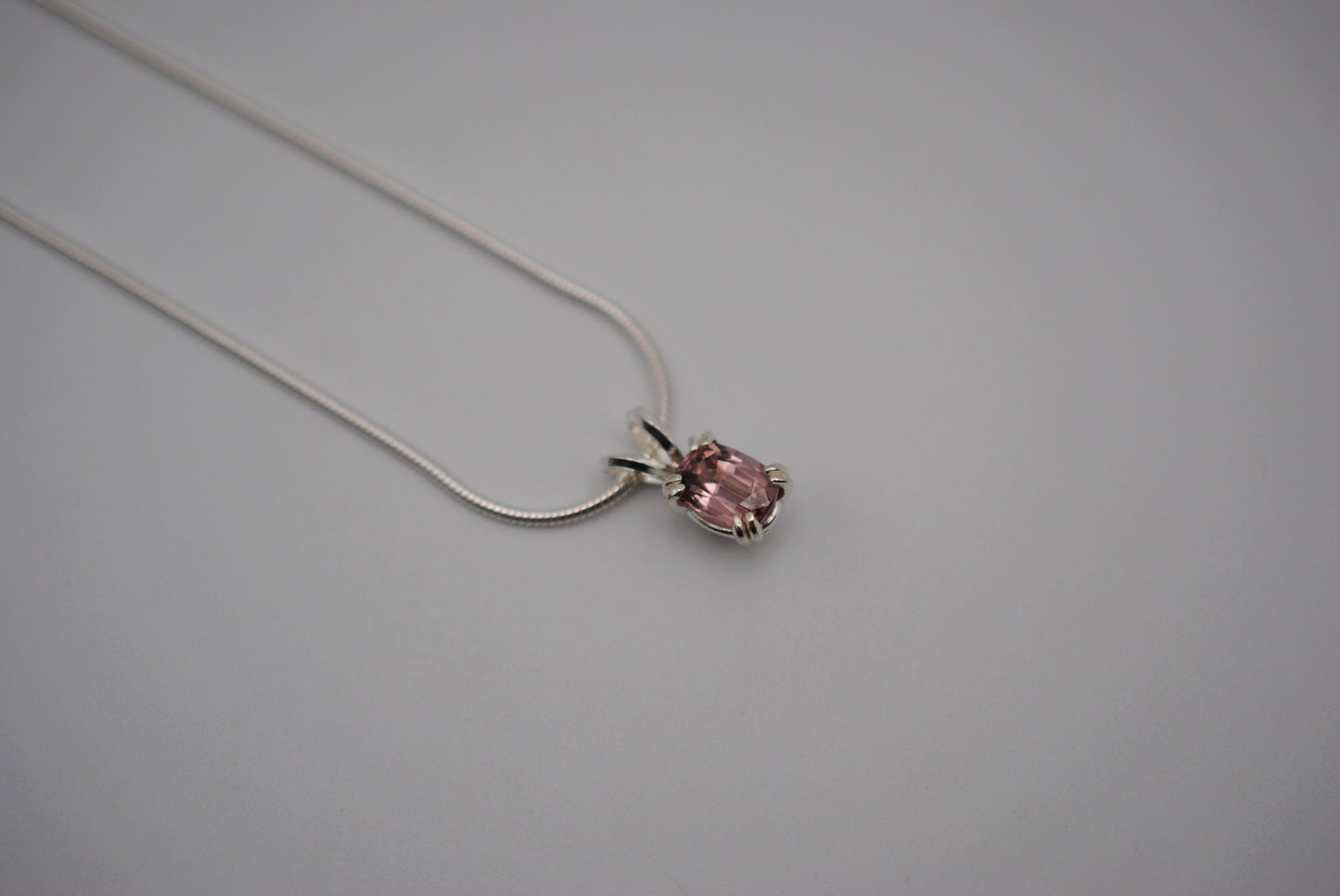 Malaia Garnet Necklace: Emerald Cut, Silver Setting, Snake Chain