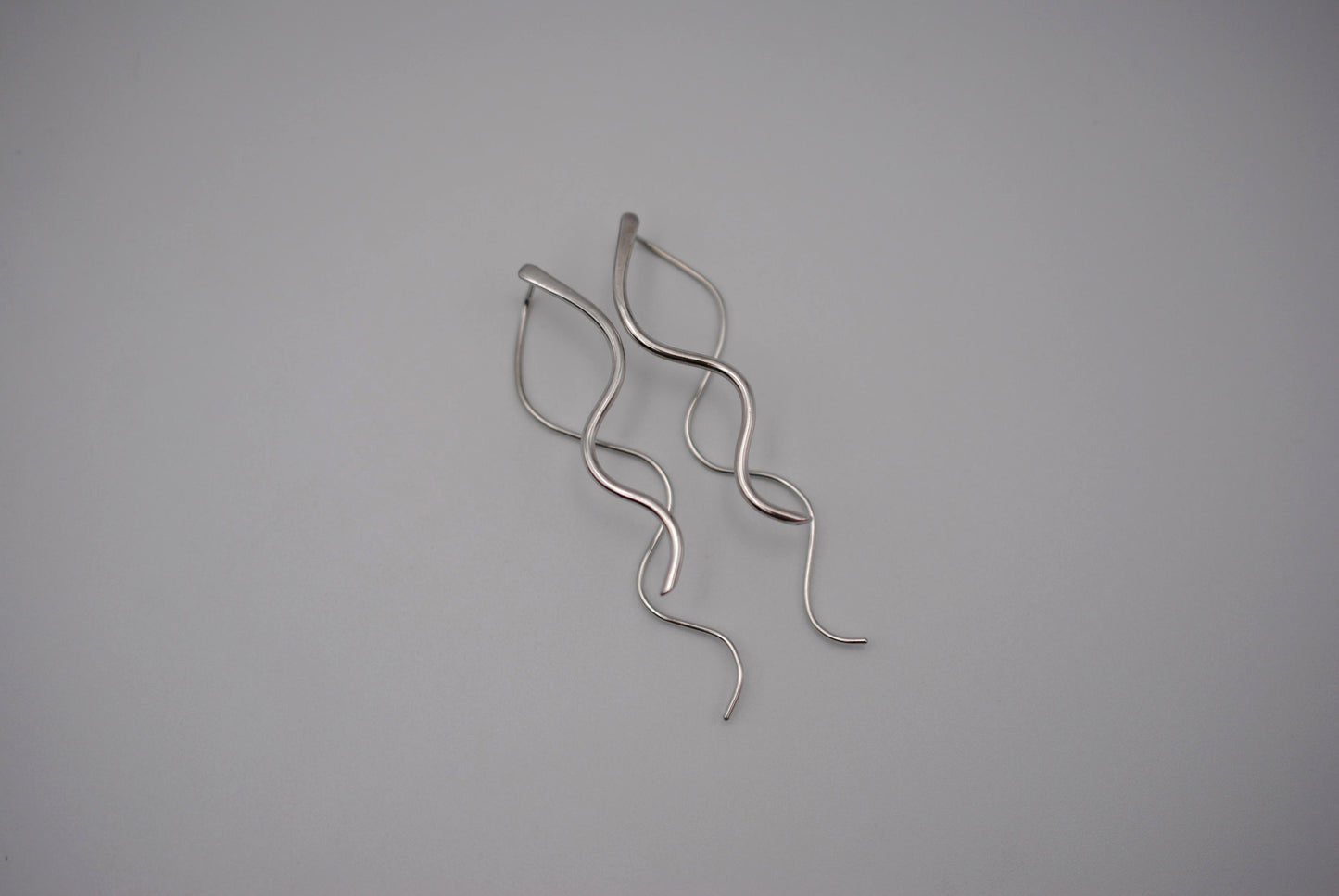 Infinity Rhodium Roots Dangle Earrings