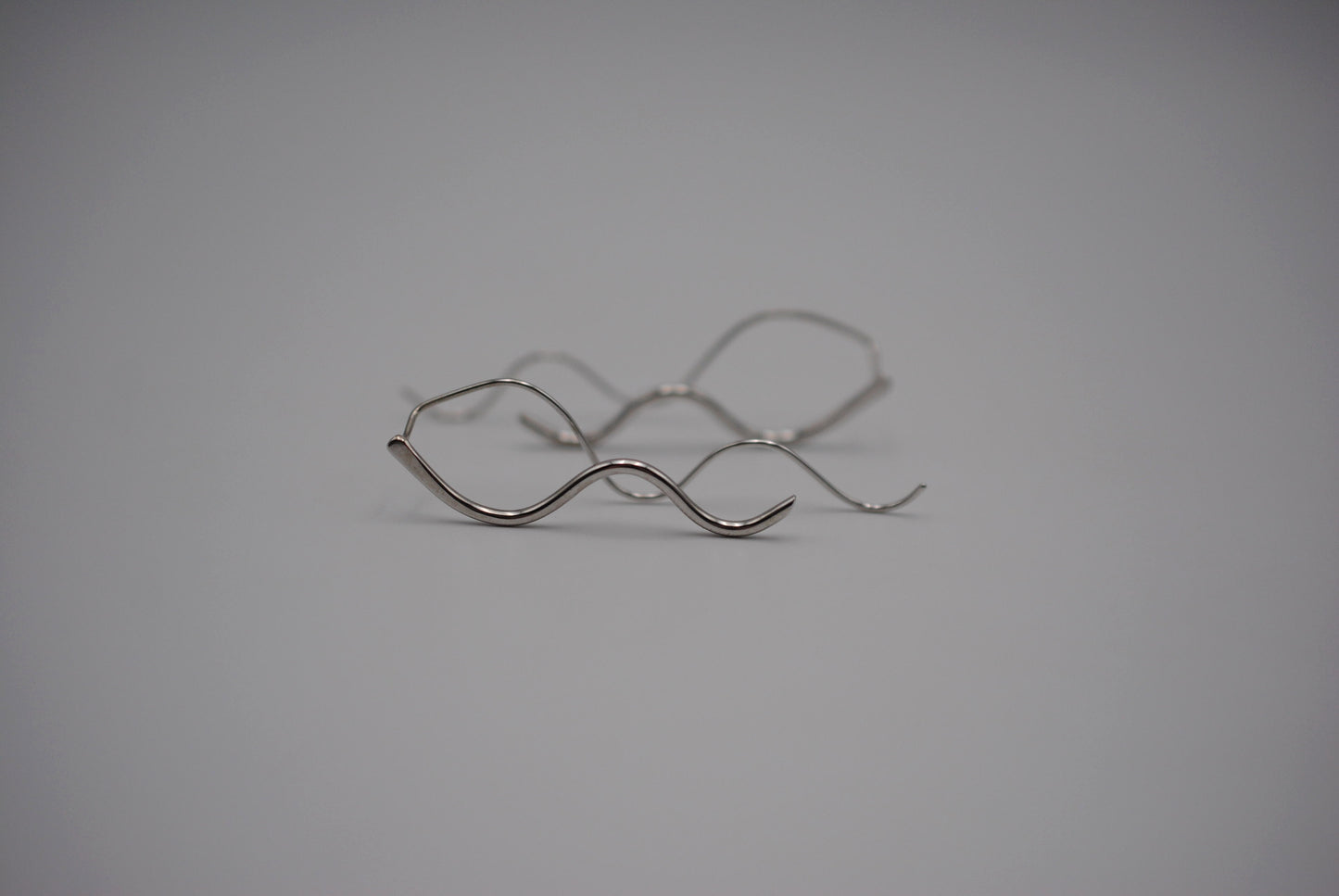 Infinity Rhodium Roots Dangle Earrings