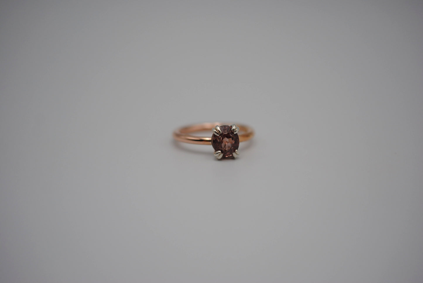 Garnet Ring: Oval Cut, Rose Gold Fill Band, Silver Setting