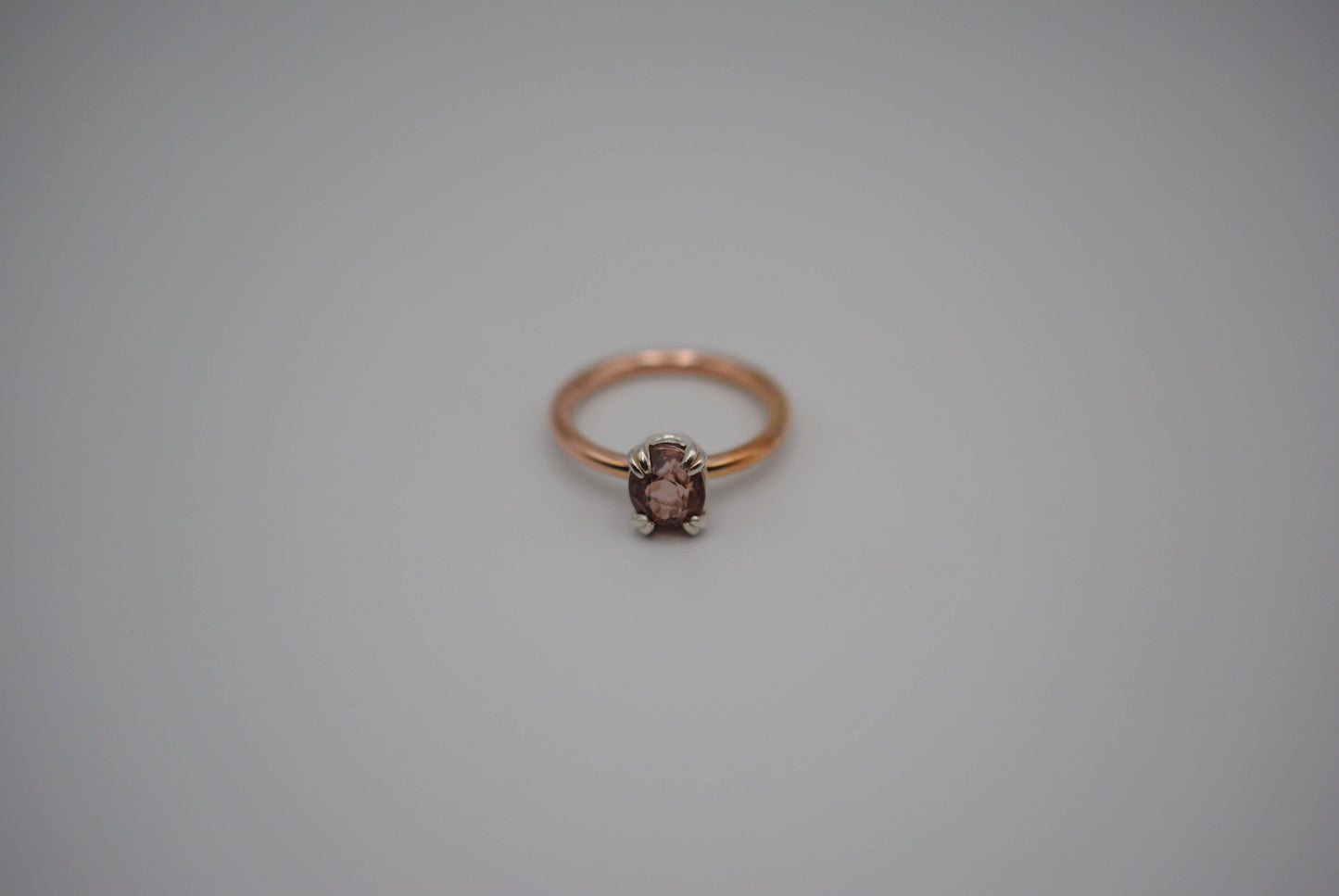 Garnet Ring: Oval Cut, Rose Gold Fill Band, Silver Setting