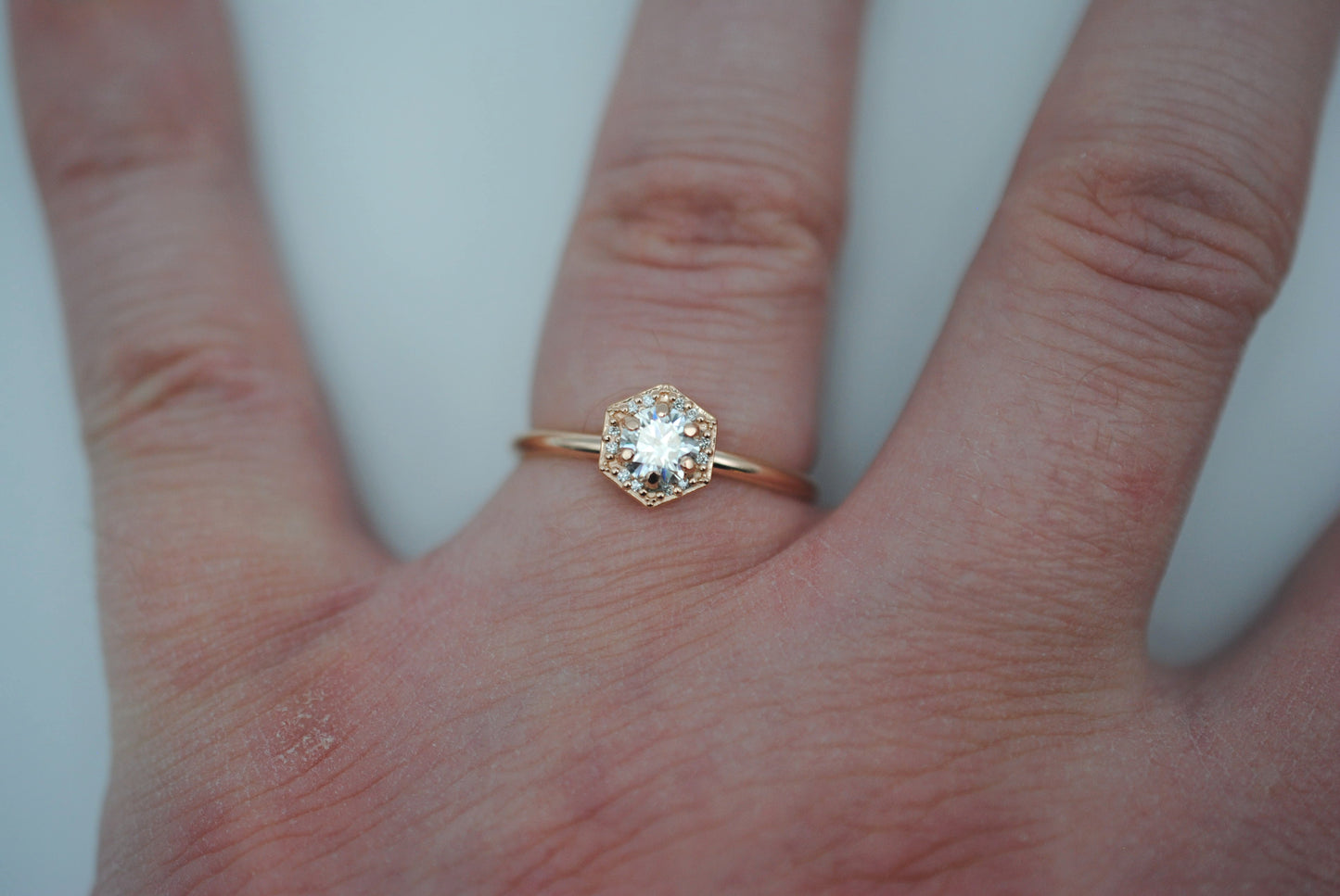 Moissanite Ring: Round Cut, Hexagon Diamond Halo, Rose Gold
