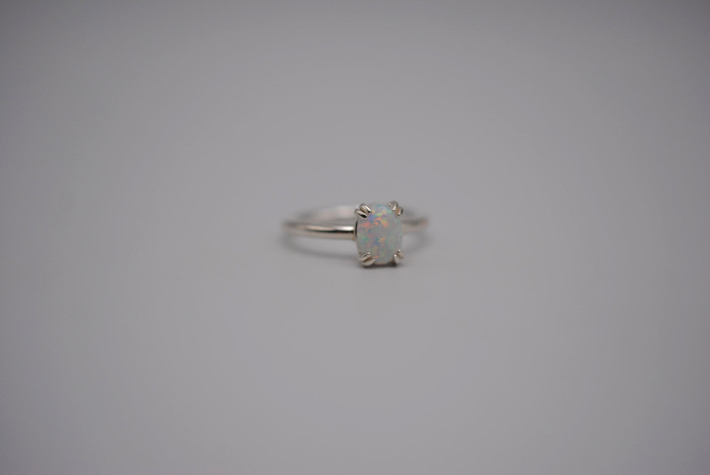 Opal Ring: Oval Cut, Silver, Double Prong Setting