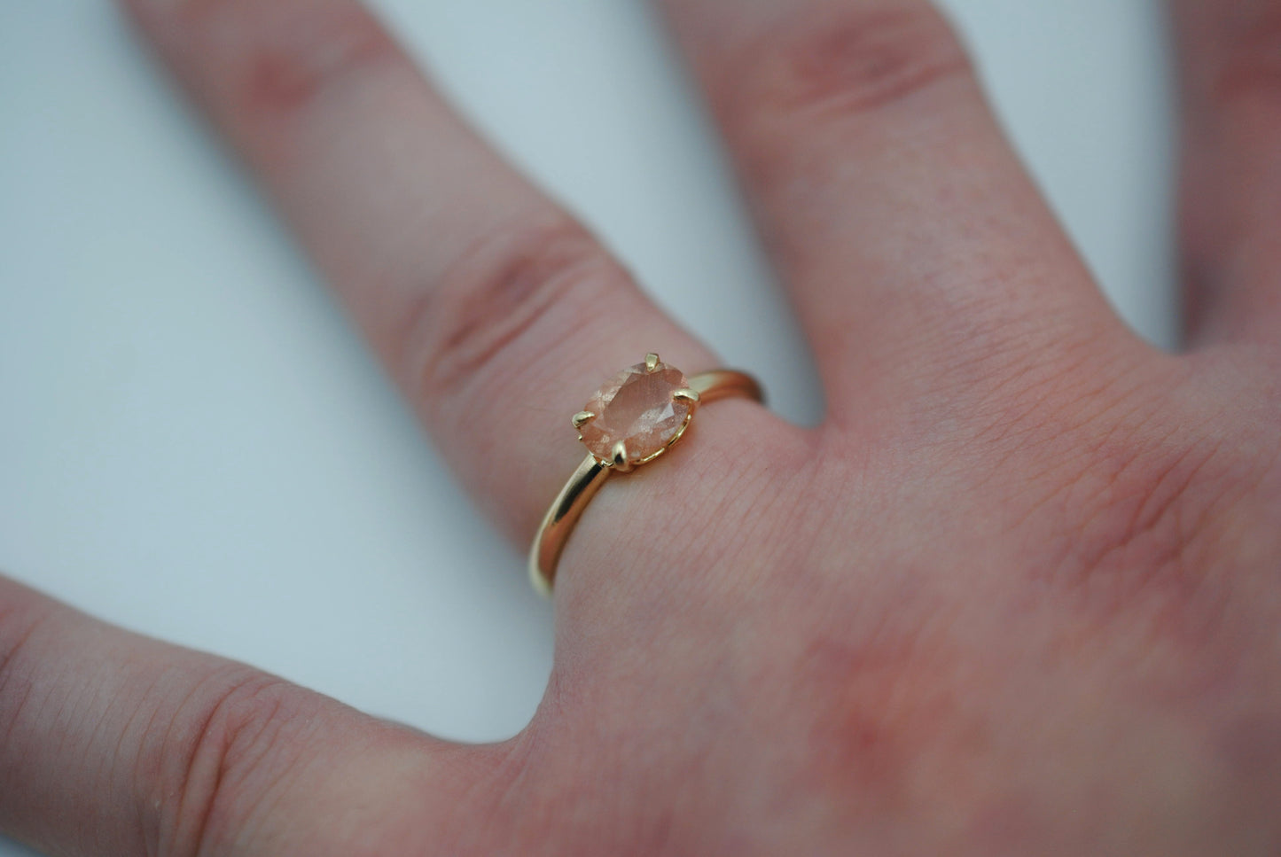 Oregon Sunstone Ring: Oval Cut, East-West Set, 14K Yellow Gold