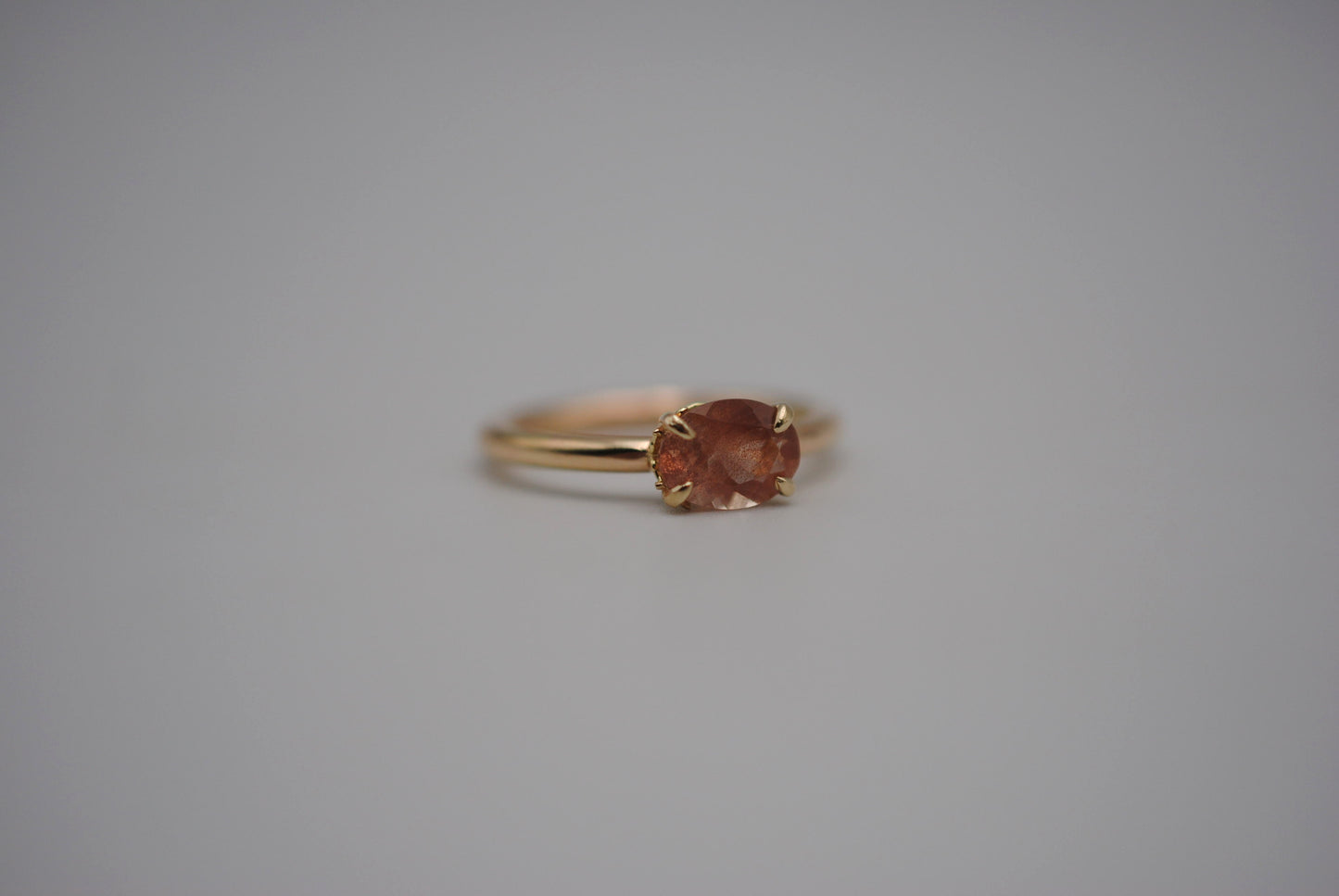 Oregon Sunstone Ring: Oval Cut, East-West Set, 14K Yellow Gold