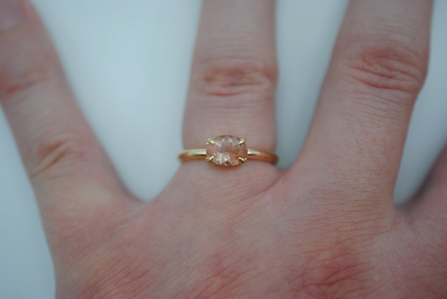 Oregon Sunstone Ring: Oval Cut, East-West Set, 14K Yellow Gold