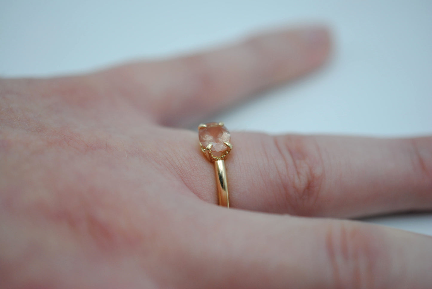 Oregon Sunstone Ring: Oval Cut, East-West Set, 14K Yellow Gold