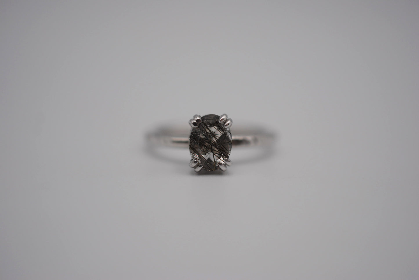 Oval Rutilated Quartz Solitaire Ring on Hammered Band