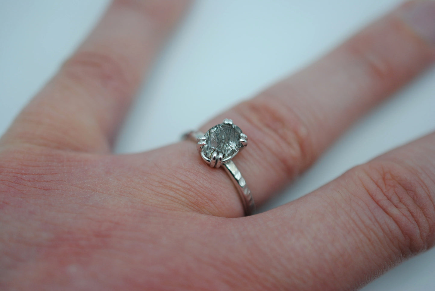 Oval Rutilated Quartz Solitaire Ring on Hammered Band