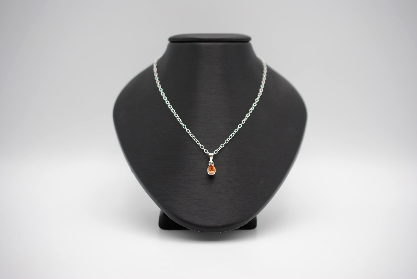 Malaia Garnet Necklace: Pear Cut, Silver Setting, Cable Chain