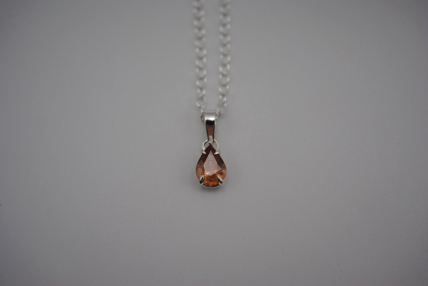 Malaia Garnet Necklace: Pear Cut, Silver Setting, Cable Chain