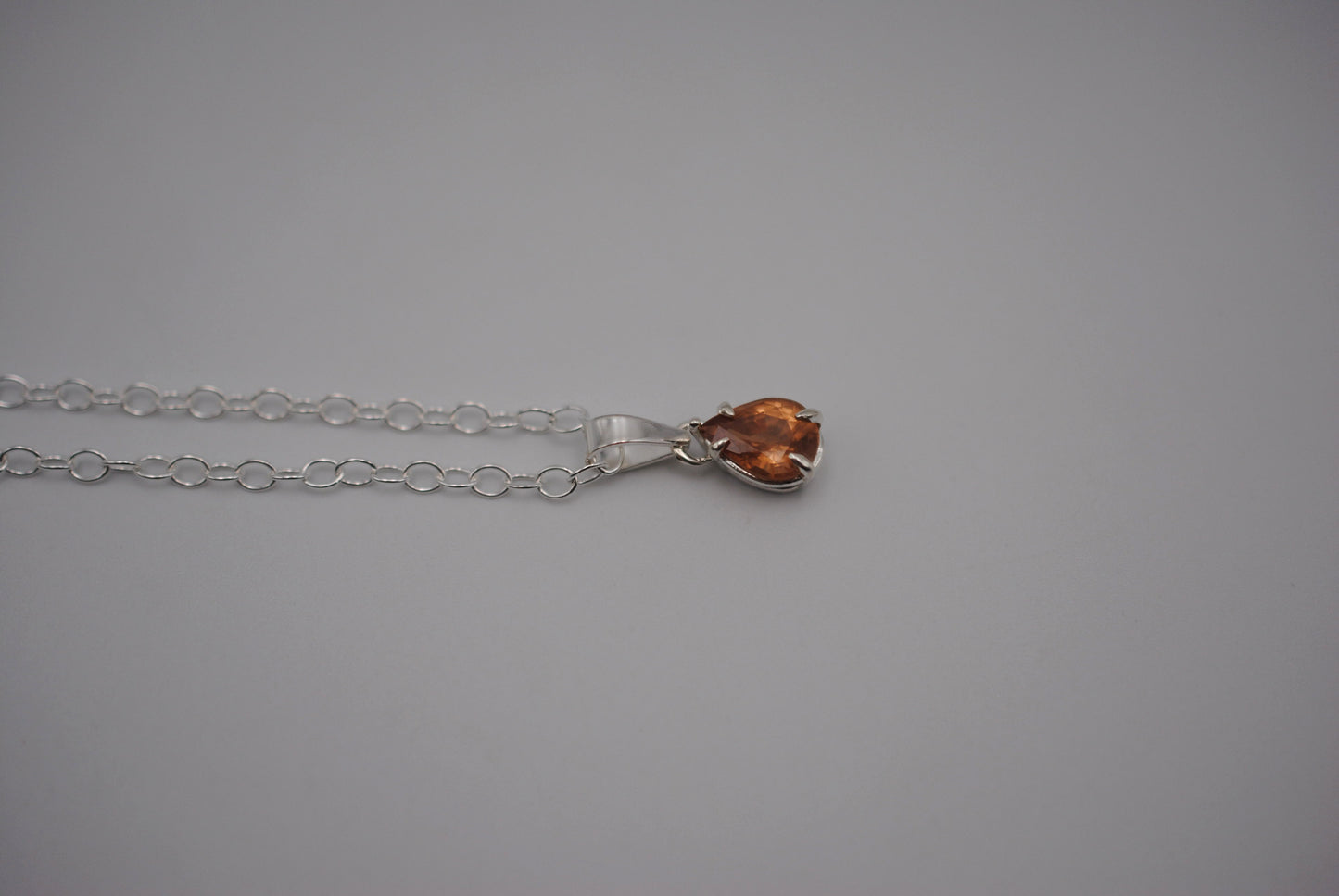 Malaia Garnet Necklace: Pear Cut, Silver Setting, Cable Chain