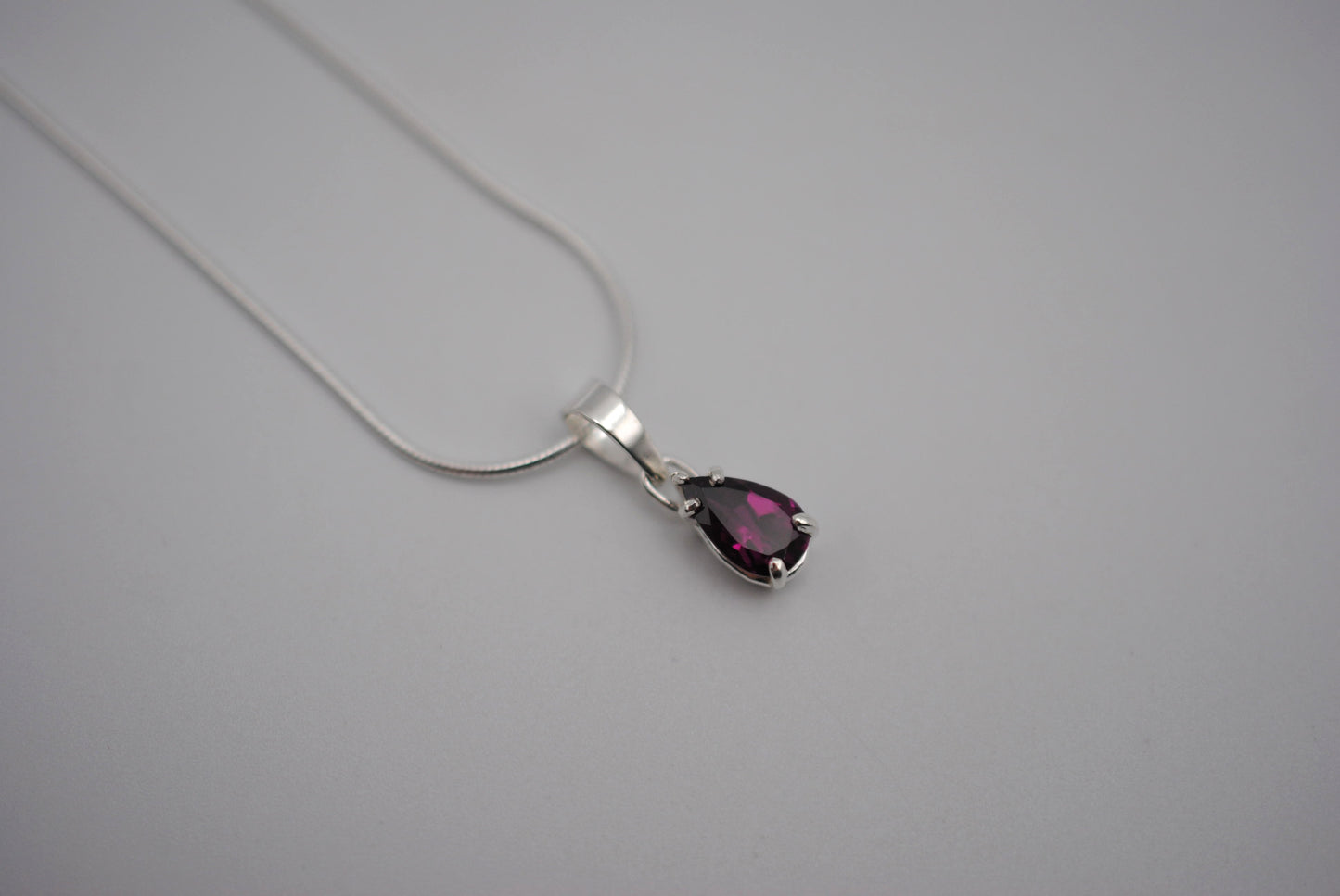 Rhodolite Garnet Necklace: Pear Cut, Silver Setting, Snake Chain