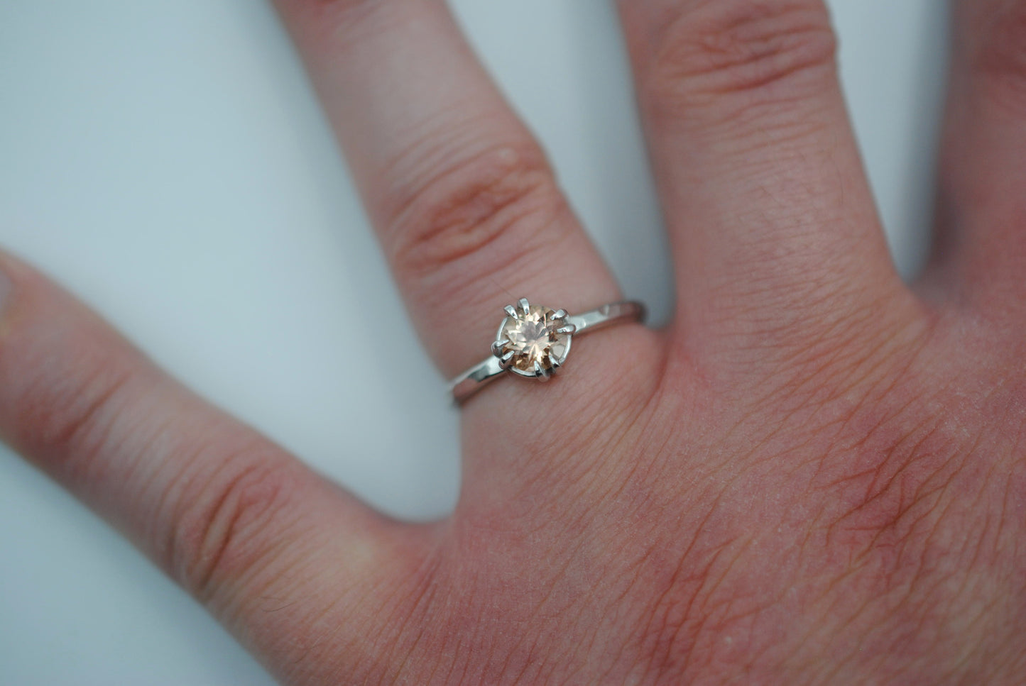 Round Oregon Sunstone Solitaire Ring with Double Prongs on Textured Band