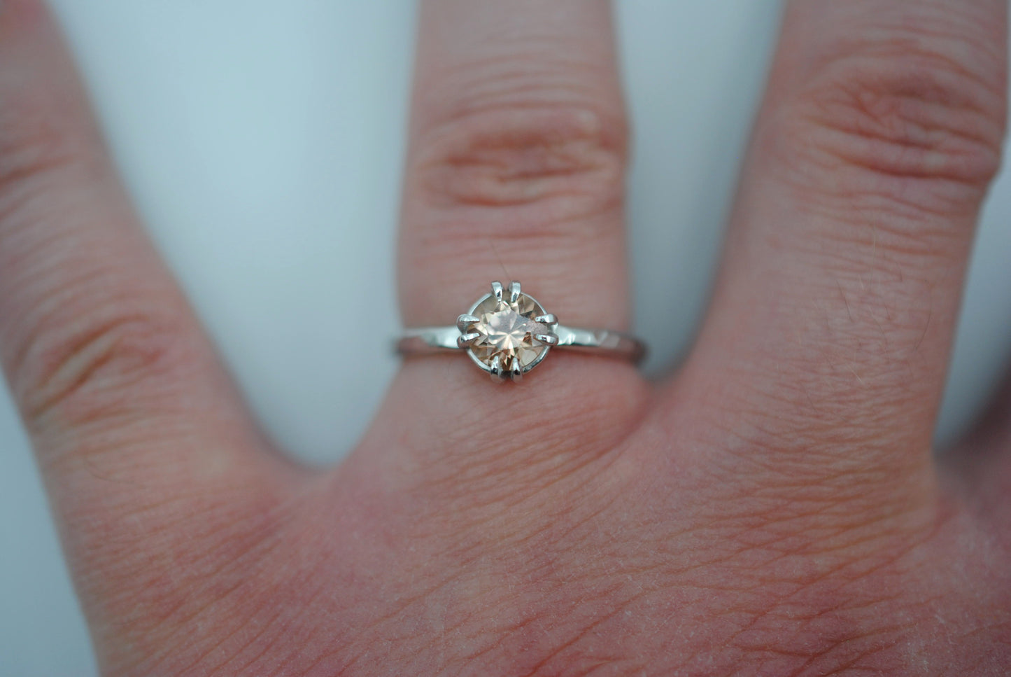 Round Oregon Sunstone Solitaire Ring with Double Prongs on Textured Band