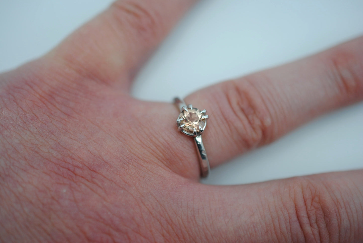 Round Oregon Sunstone Solitaire Ring with Double Prongs on Textured Band
