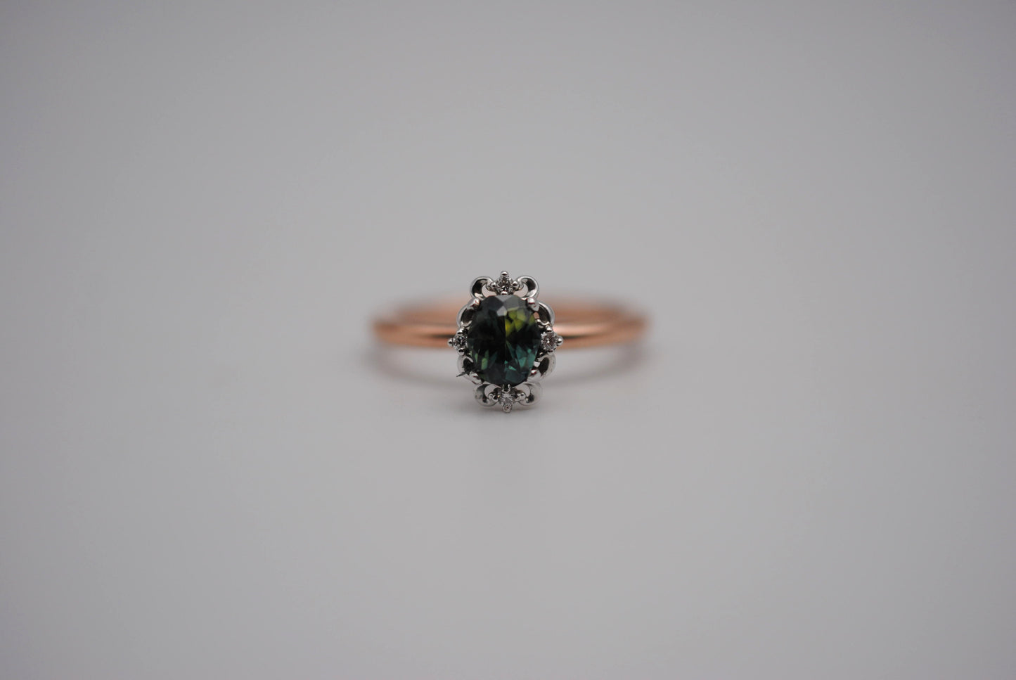 Oval Nigerian Sapphire on Rose Gold Band in Vintage Diamond White Gold Setting Ring