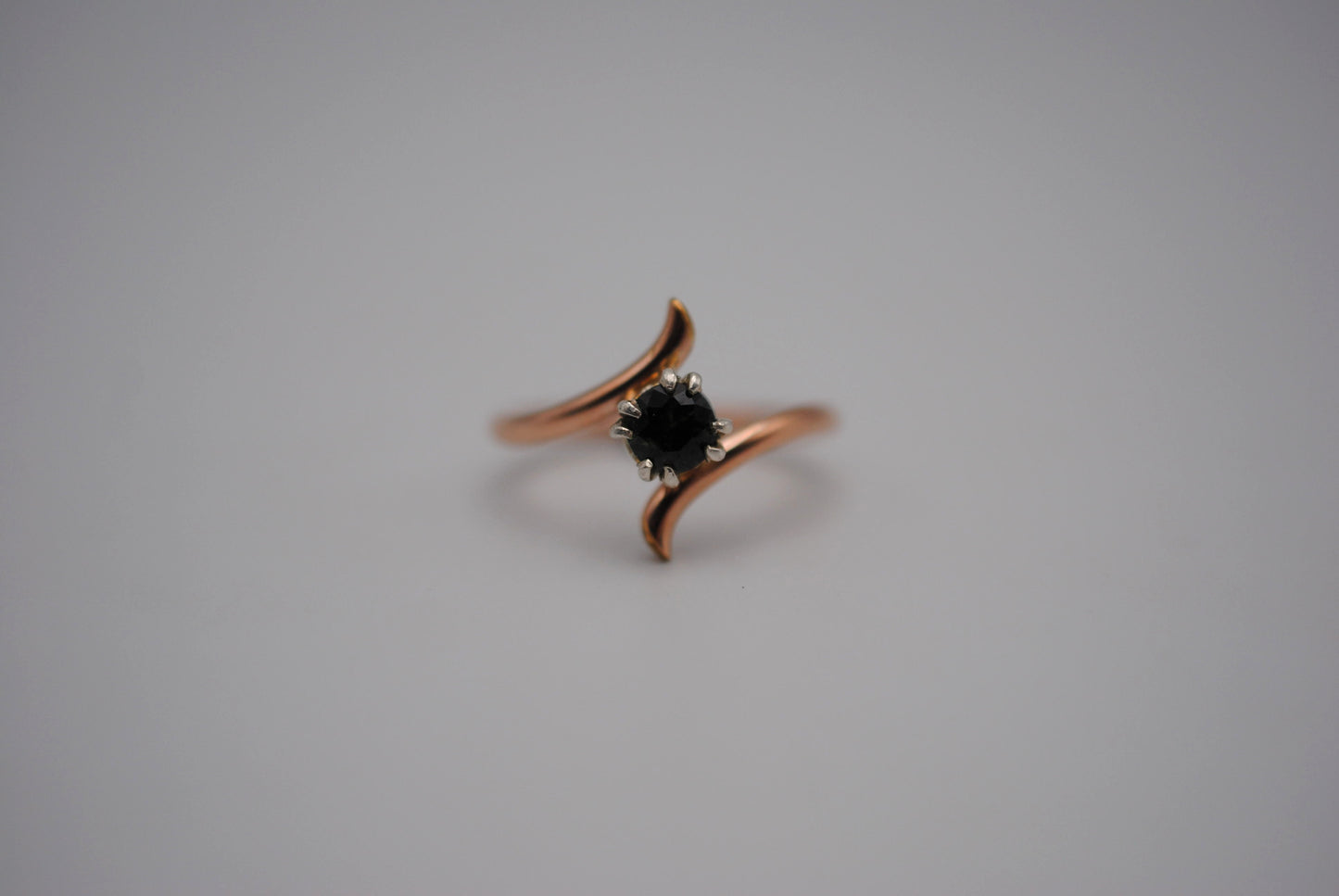 Round Nigerian Sapphire on Rose Gold Bypass Band in Silver Setting Ring