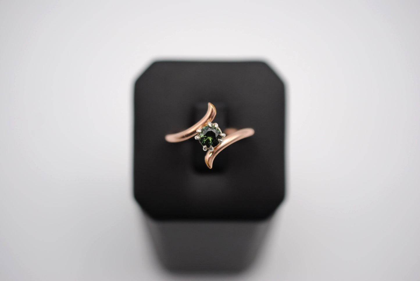 Round Nigerian Sapphire on Rose Gold Bypass Band in Silver Setting Ring