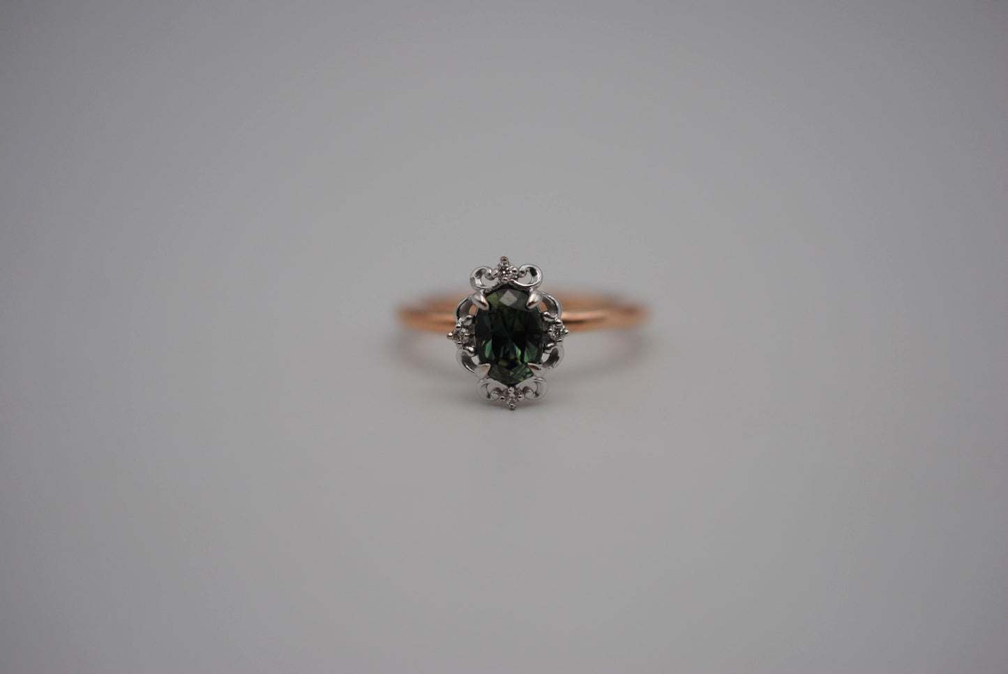 Sapphire Ring: Oval Cut, Rose Gold Band, Melee White Gold Setting