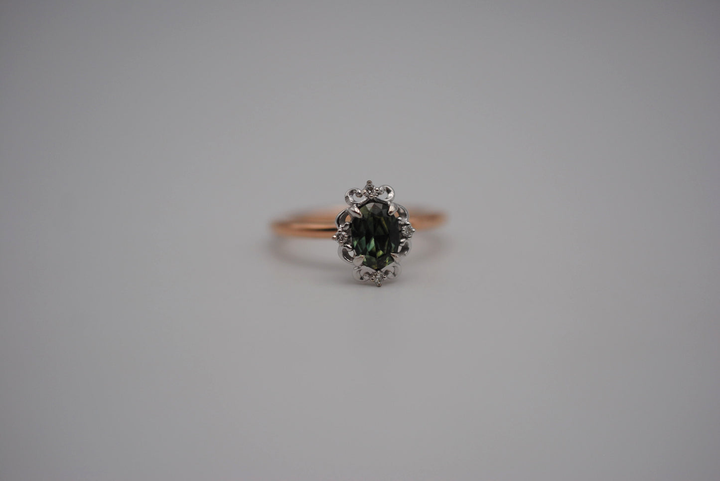 Sapphire Ring: Oval Cut, Rose Gold Band, Melee White Gold Setting