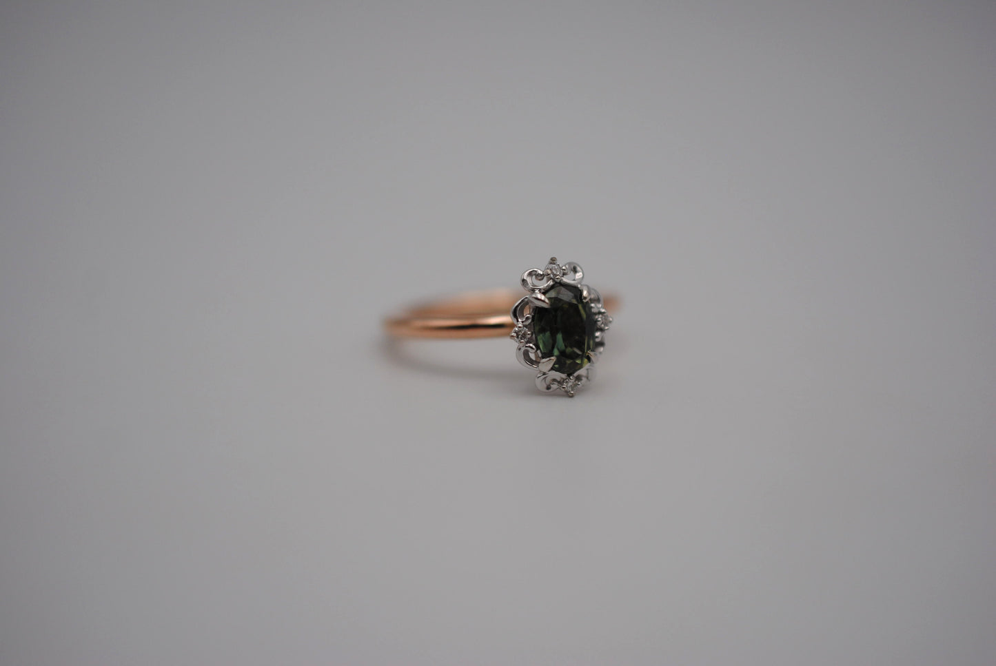 Sapphire Ring: Oval Cut, Rose Gold Band, Melee White Gold Setting