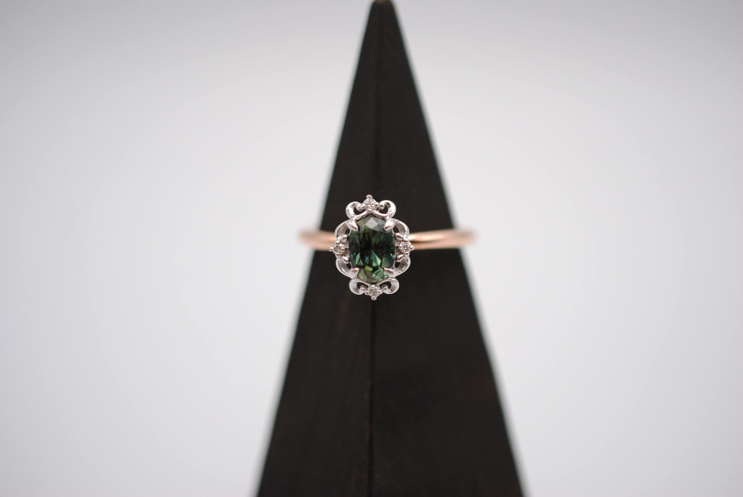 Sapphire Ring: Oval Cut, Rose Gold Band, Melee White Gold Setting