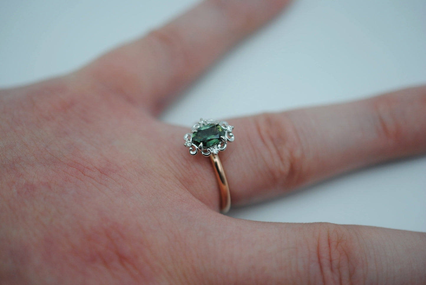 Sapphire Ring: Oval Cut, Rose Gold Band, Melee White Gold Setting