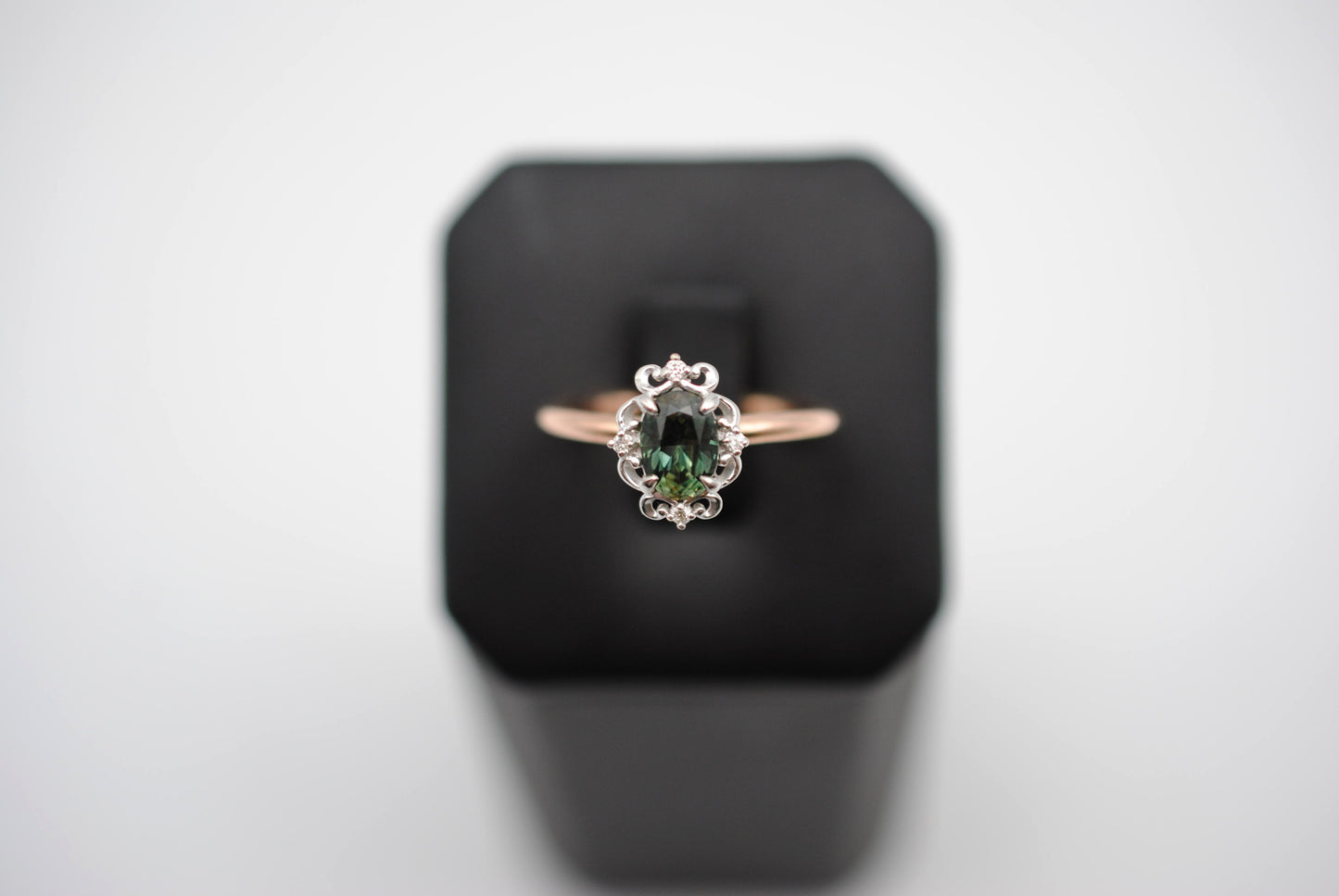 Sapphire Ring: Oval Cut, Rose Gold Band, Melee White Gold Setting