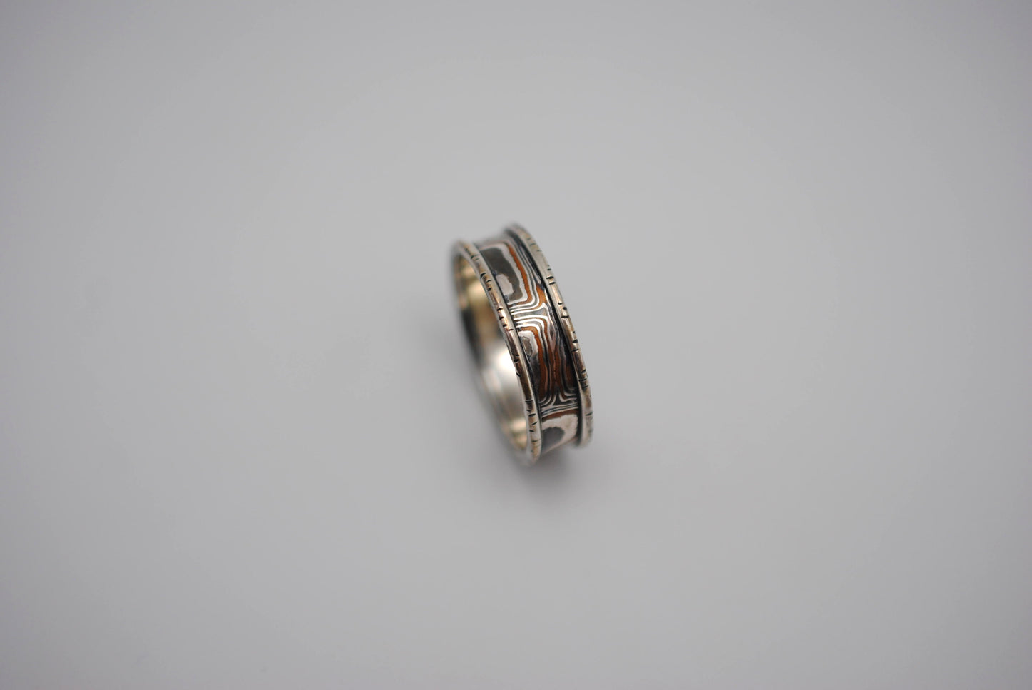 Three Tone Copper, Silver, Shibuichi Mokume Gane Ring with Silver Birch Banding